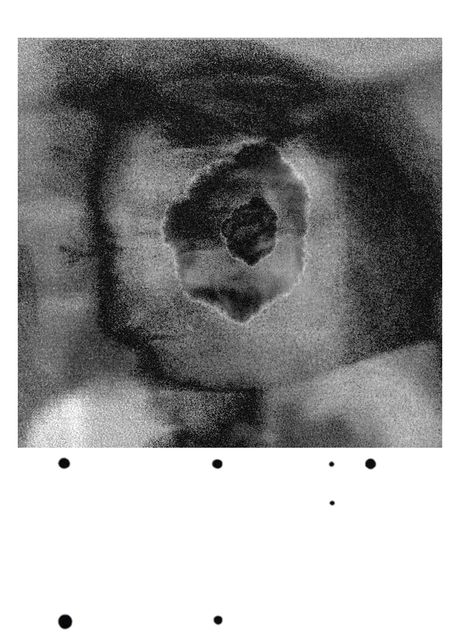 charcoal-soft figure with circular wound-form, scattered round marks below